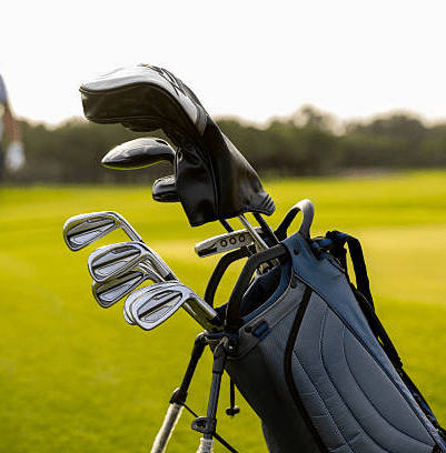 Detailed shot of a golf bag filled with golf clubs, showing club heads arranged neatly above the bag’s rim.